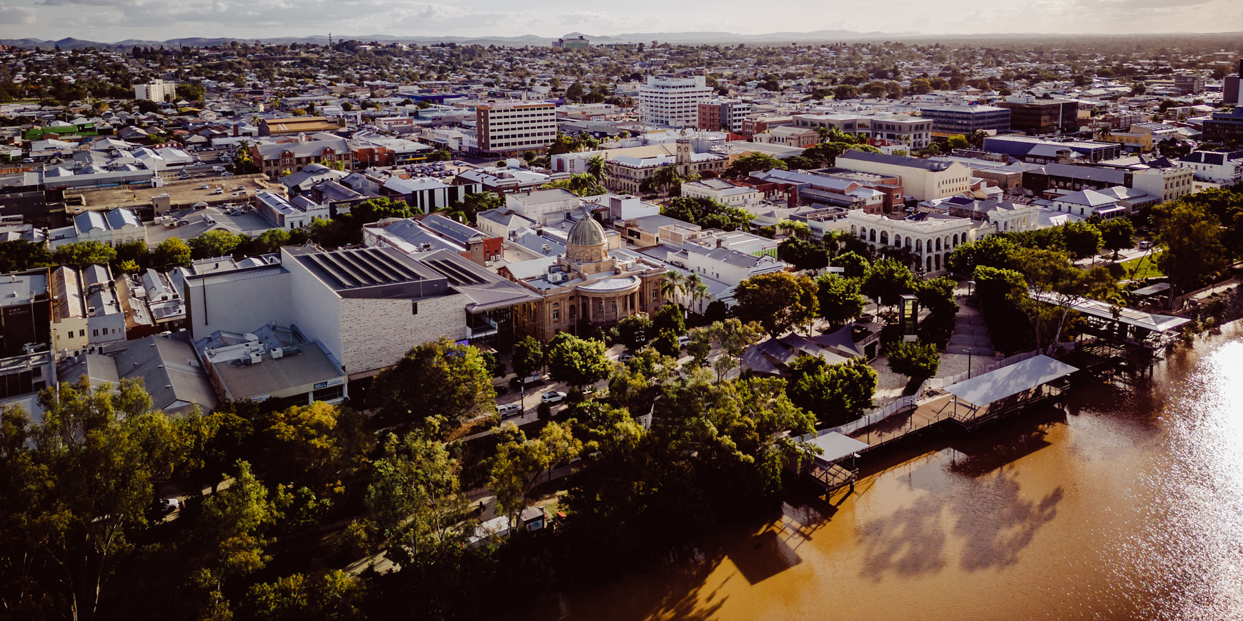 Aerial view of Rockhampton Riverside Precinct with Fitzroy River in foreground